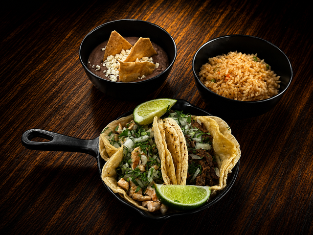 2 Tacos + Arroz y Frijoles | 2 Tacos + Rice and Beans.